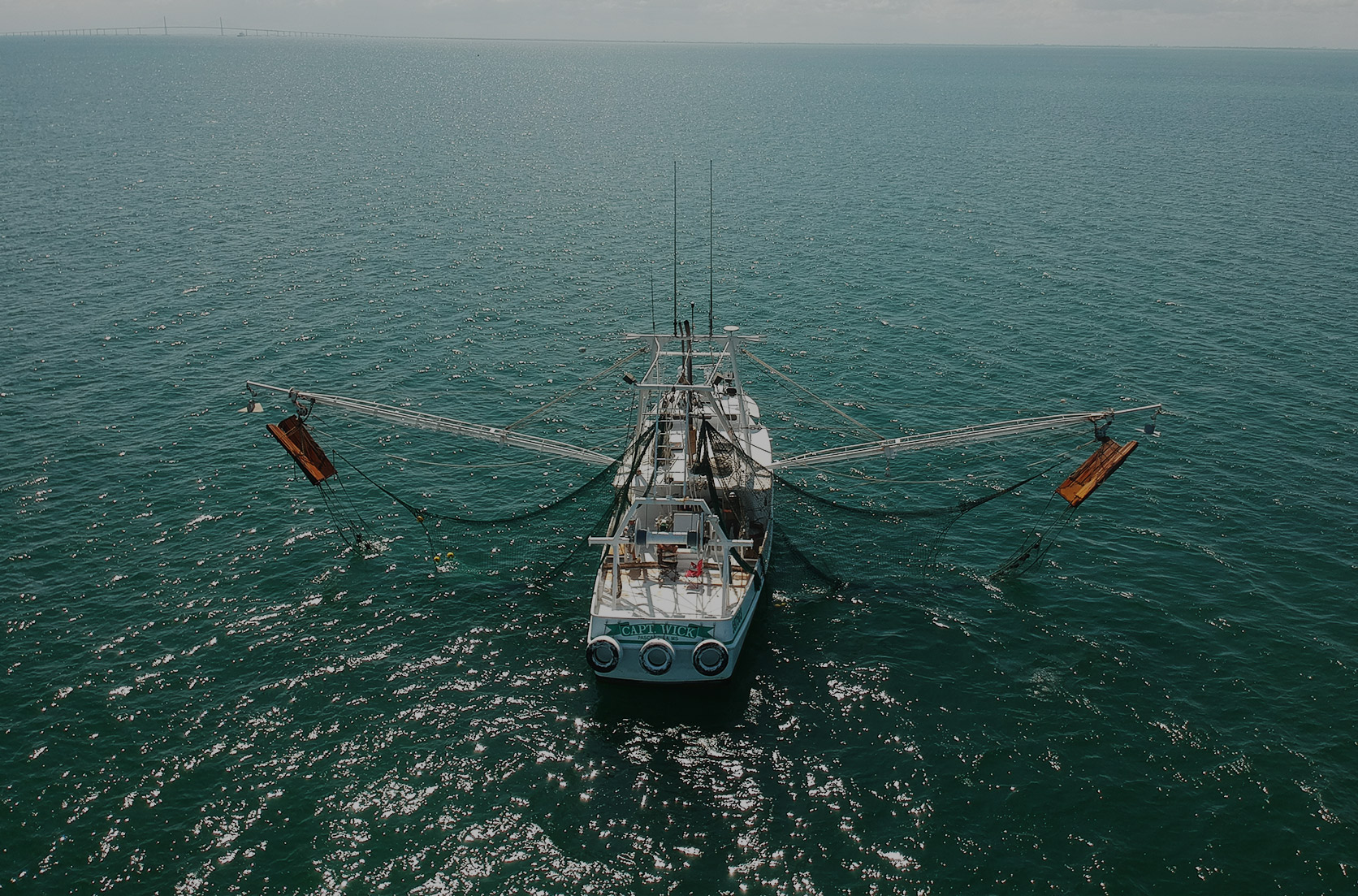 Relocation trawling vessel operating on the water
